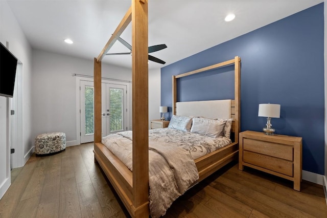 bedroom with dark hardwood / wood-style flooring, access to outside, and ceiling fan