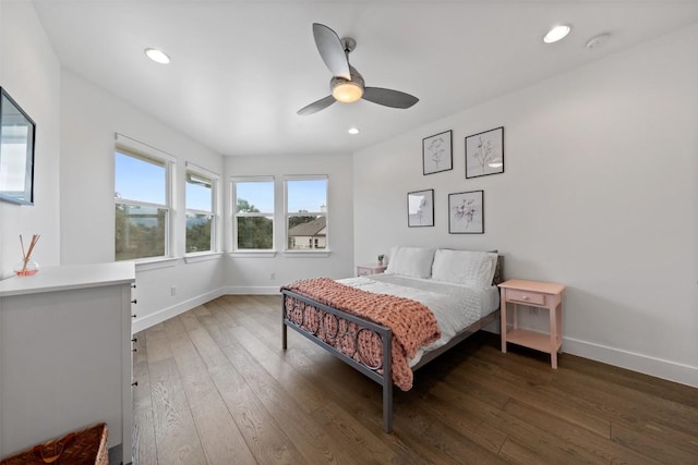 bedroom featuring dark wood-type flooring and ceiling fan