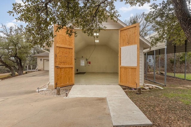 view of outbuilding featuring a garage