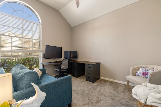 office area featuring lofted ceiling and light carpet