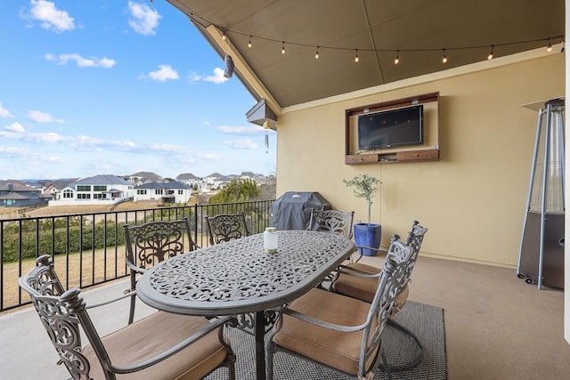 balcony with a residential view and grilling area