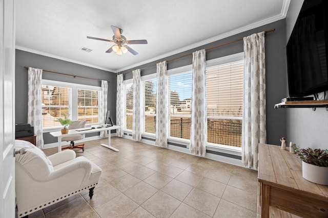 sunroom / solarium featuring visible vents and ceiling fan