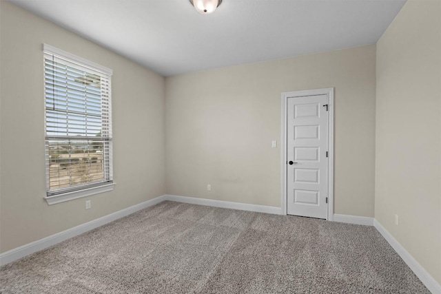 unfurnished room with carpet floors