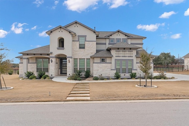 305 Miranda Way, Georgetown, TX 78633 - view of front of property with stone siding, stucco siding, and a shingled roof