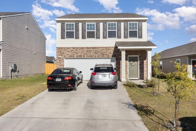 view of front of home featuring a garage and a front lawn