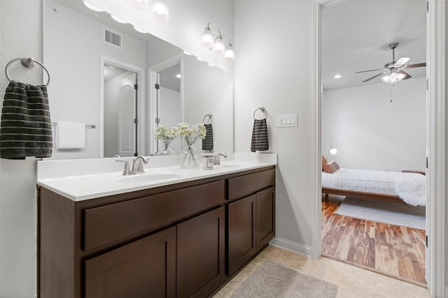 bathroom with vanity, tile patterned floors, and ceiling fan