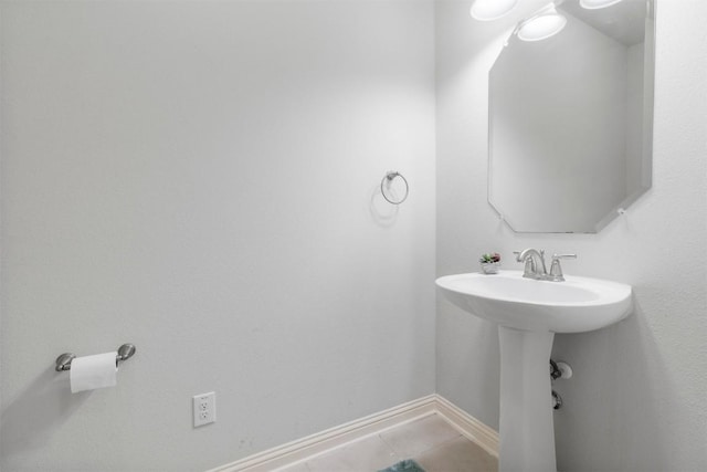 bathroom featuring tile patterned flooring