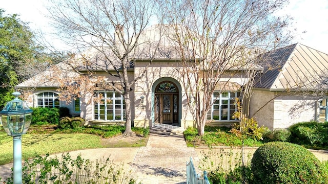 view of front of house with brick siding