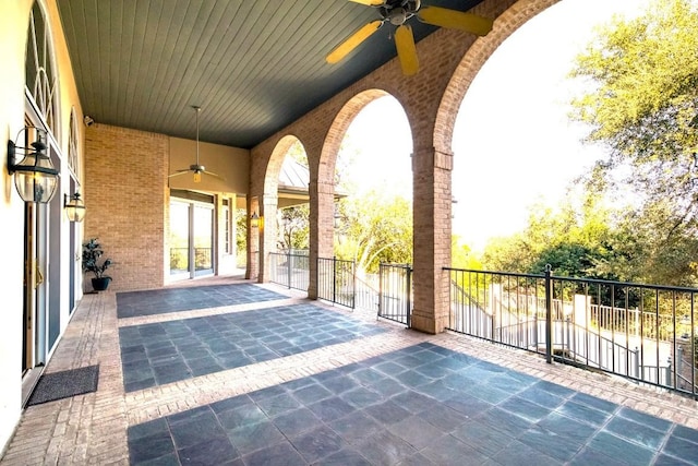 patio / terrace featuring a ceiling fan
