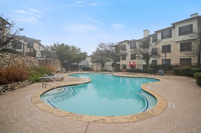 view of pool with a patio