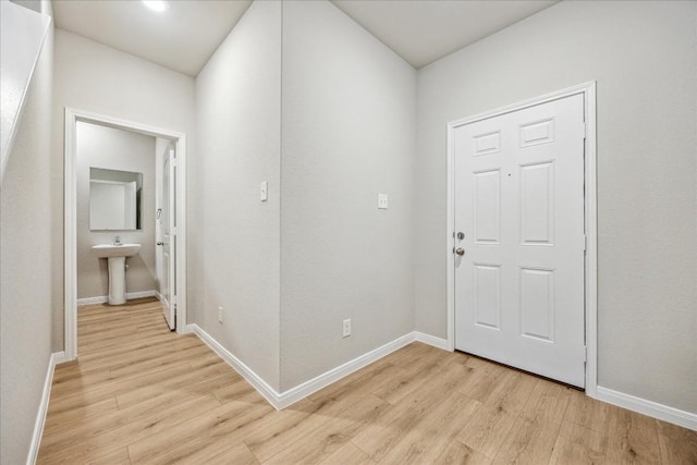 foyer entrance featuring light hardwood / wood-style floors