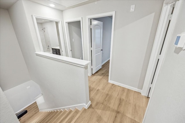 corridor featuring light hardwood / wood-style flooring