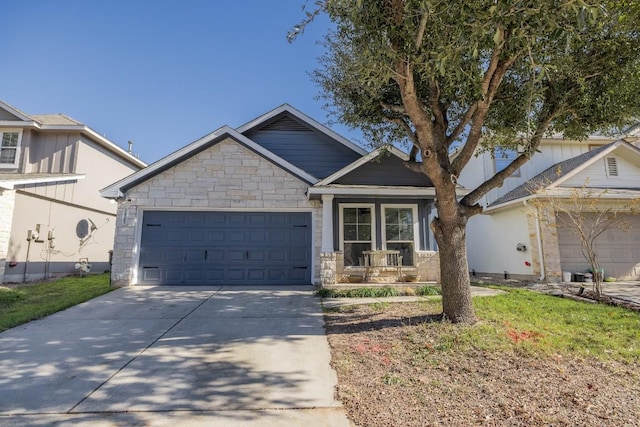 craftsman-style home with a garage and covered porch