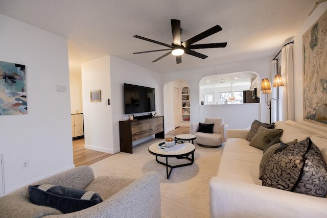 living room with ceiling fan