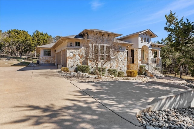 view of front of property with a garage