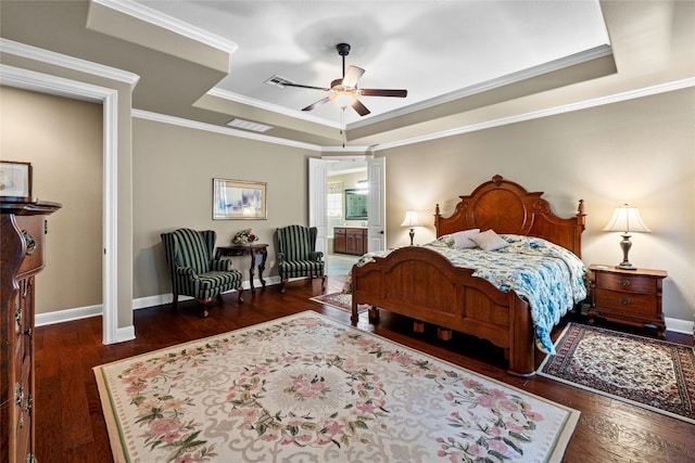 804 Laughing Dog Ct, Leander, TX 78641 - bedroom featuring a tray ceiling, wood finished floors, crown molding, and ceiling fan
