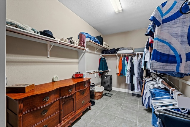 804 Laughing Dog Ct, Leander, TX 78641 - spacious closet featuring light tile patterned floors