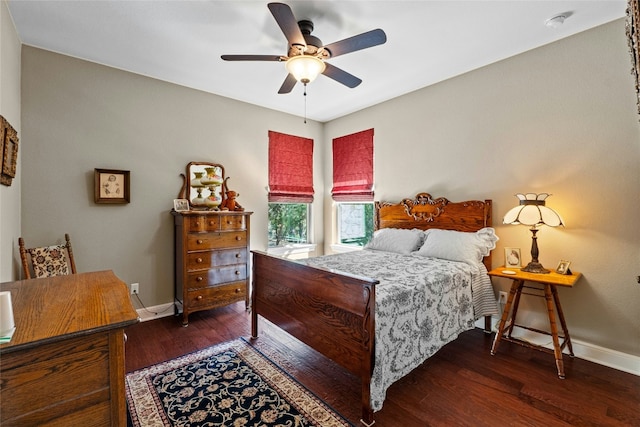804 Laughing Dog Ct, Leander, TX 78641 - bedroom featuring baseboards, wood finished floors, and a ceiling fan
