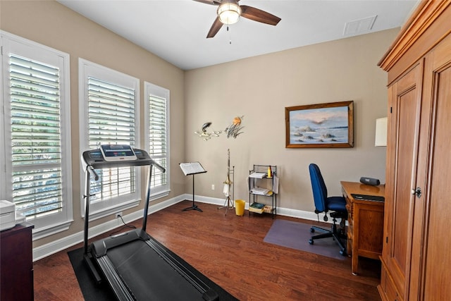 804 Laughing Dog Ct, Leander, TX 78641 - exercise area with a ceiling fan and dark wood-style flooring