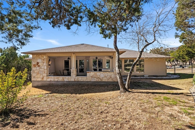 804 Laughing Dog Ct, Leander, TX 78641 - rear view of house featuring ceiling fan and stone siding