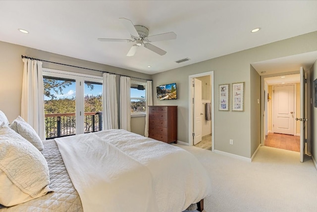 carpeted bedroom featuring ceiling fan, ensuite bathroom, and access to outside