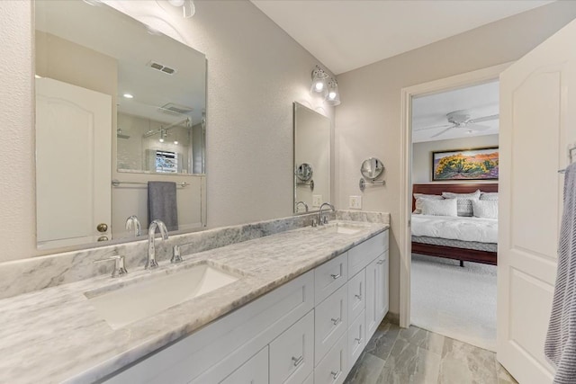 bathroom featuring vanity and ceiling fan