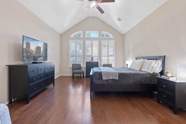 bedroom featuring vaulted ceiling, ceiling fan, and dark hardwood / wood-style flooring