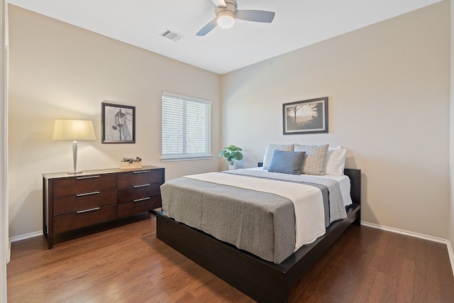 bedroom featuring hardwood / wood-style floors and ceiling fan