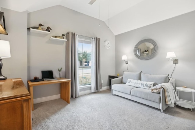 carpeted living room with ceiling fan, baseboards, and vaulted ceiling