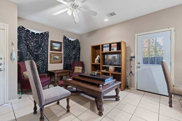 miscellaneous room with ceiling fan and light tile patterned flooring