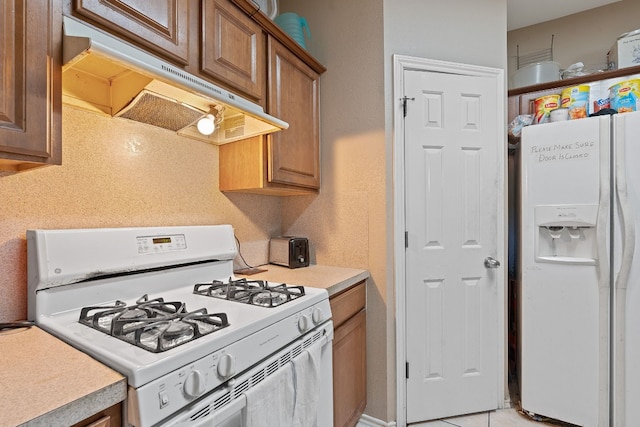 kitchen featuring white appliances