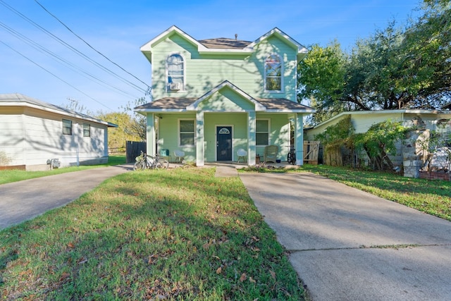 view of front of property featuring a porch and a front yard