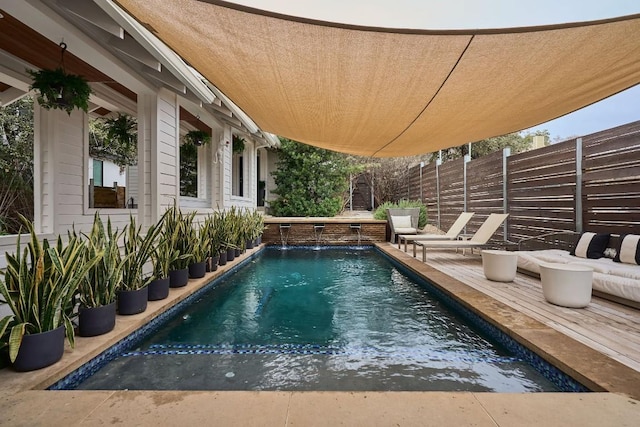 view of pool featuring pool water feature