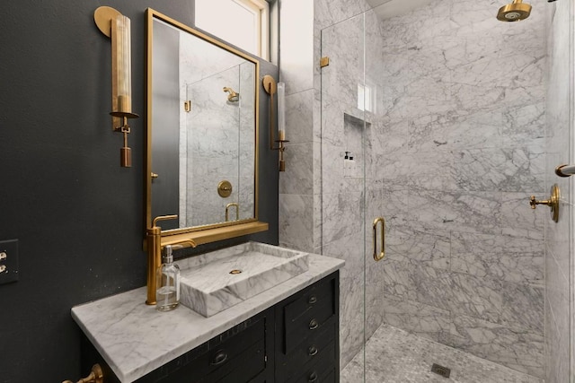 bathroom with vanity and an enclosed shower