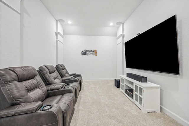 home theater with light carpet