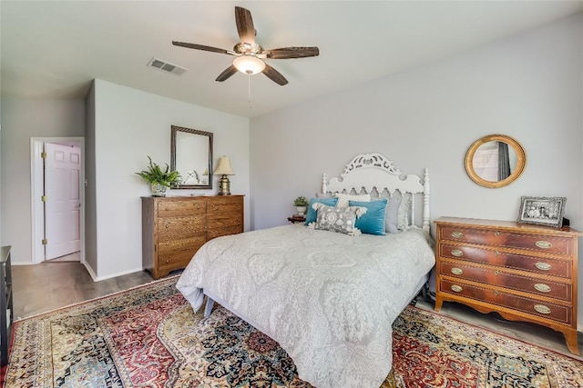 bedroom featuring hardwood / wood-style floors and ceiling fan