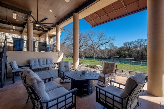 view of patio / terrace featuring outdoor lounge area and ceiling fan