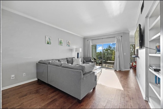 living room with crown molding and dark hardwood / wood-style floors