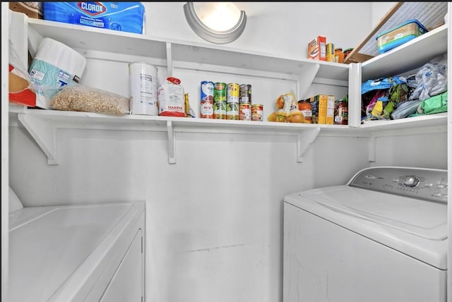 washroom with washer and clothes dryer