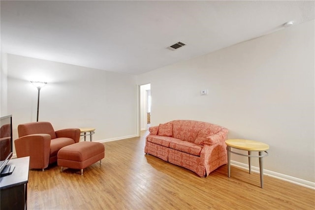 sitting room featuring light wood-type flooring