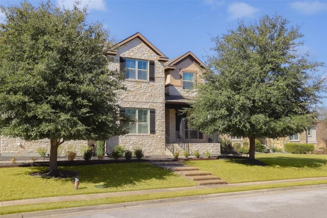 view of front of home with a front yard