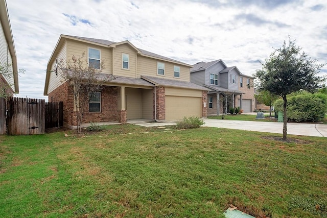 view of front of property with a garage and a front yard