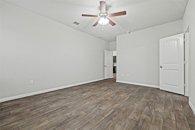 unfurnished bedroom featuring dark wood-type flooring and ceiling fan