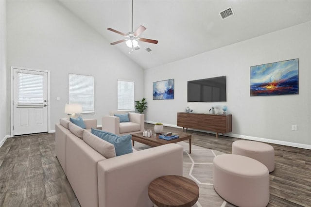 living room with ceiling fan, high vaulted ceiling, and hardwood / wood-style floors