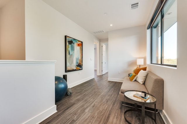 living area featuring dark hardwood / wood-style floors