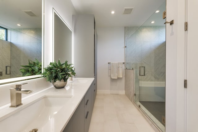 bathroom with vanity and walk in shower