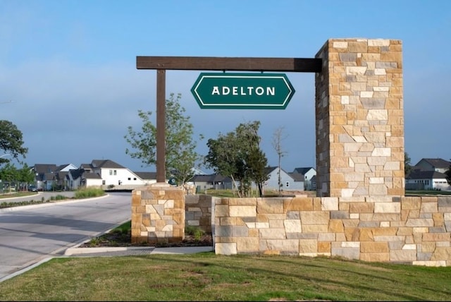 view of community sign