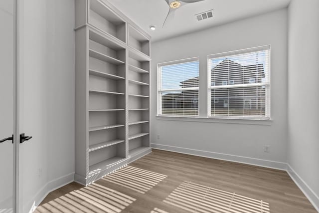 unfurnished room featuring hardwood / wood-style floors