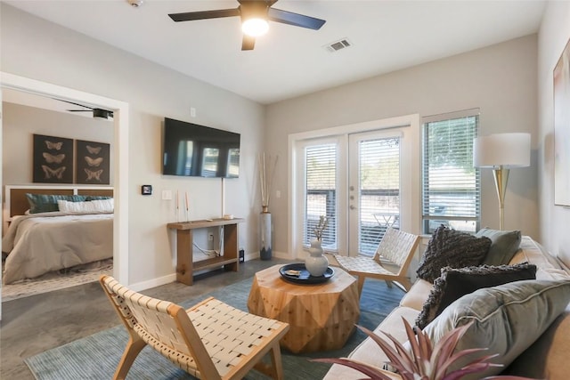 living room featuring ceiling fan