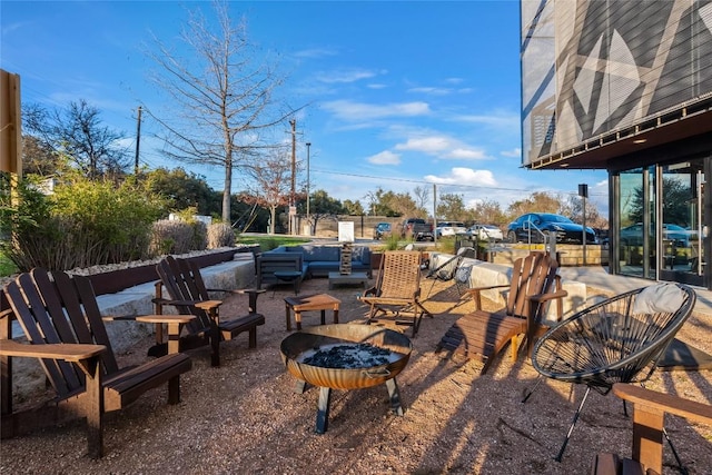 view of patio featuring a fire pit